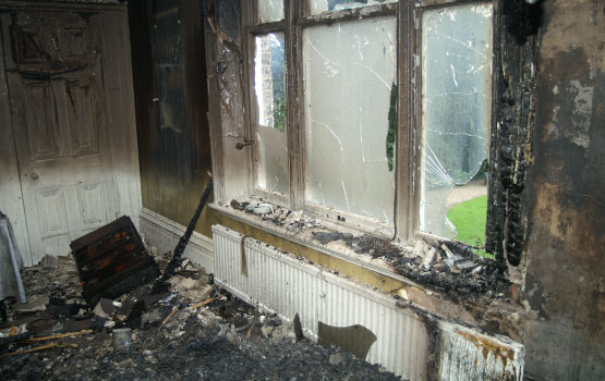 water damaged room after extinguishing fire